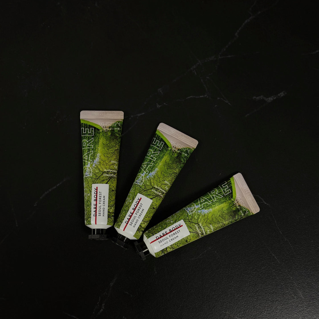 Three green skincare products with labels on a black background